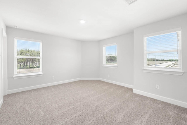 332 Live Oak Ln, Hutchins, TX 75141 - empty room with baseboards and light colored carpet
