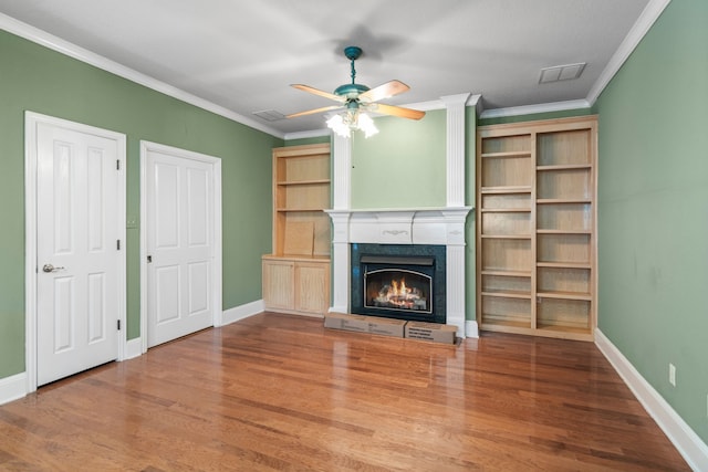504 Hilltop Pl, Joshua, TX 76058 - unfurnished living room featuring wood finished floors, a fireplace, a ceiling fan, ornamental molding, and baseboards