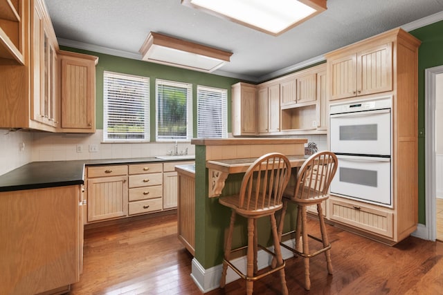 504 Hilltop Pl, Joshua, TX 76058 - kitchen featuring double oven, ornamental molding, dark wood-style floors, open shelves, and tasteful backsplash