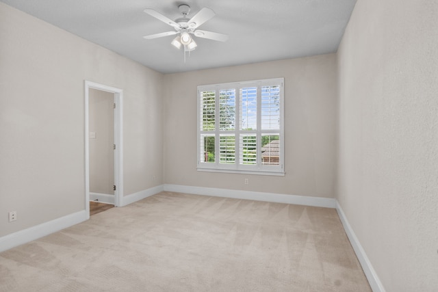 504 Hilltop Pl, Joshua, TX 76058 - unfurnished room featuring a ceiling fan, carpet floors, and baseboards