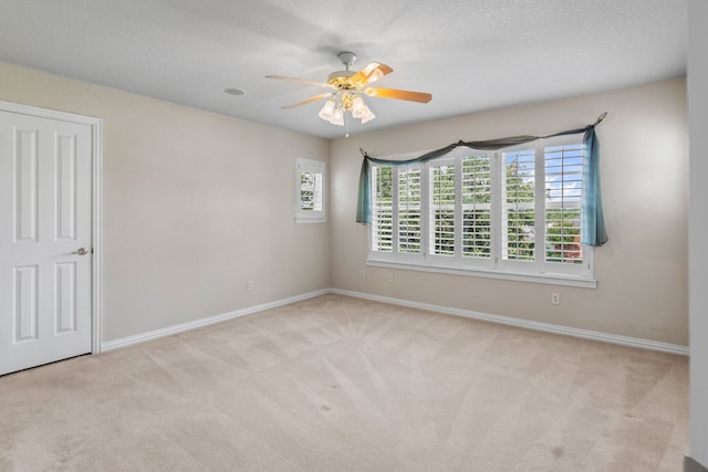504 Hilltop Pl, Joshua, TX 76058 - spare room featuring carpet flooring, baseboards, and ceiling fan