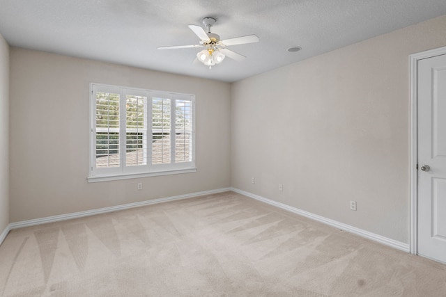 504 Hilltop Pl, Joshua, TX 76058 - empty room featuring light carpet, baseboards, and a ceiling fan