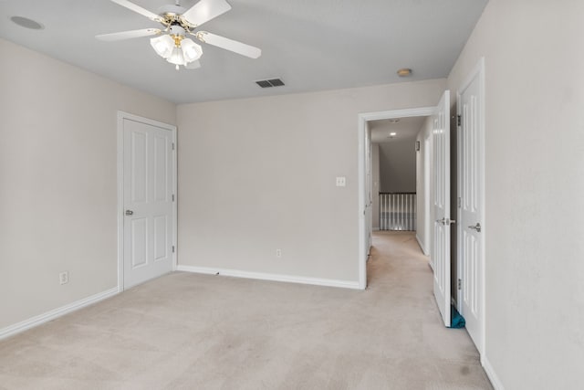 504 Hilltop Pl, Joshua, TX 76058 - unfurnished room with light carpet, a ceiling fan, and baseboards
