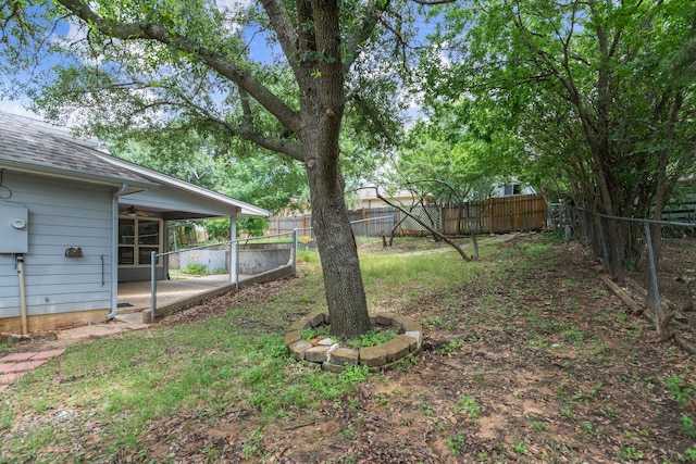 504 Hilltop Pl, Joshua, TX 76058 - fenced backyard featuring ceiling fan and a patio
