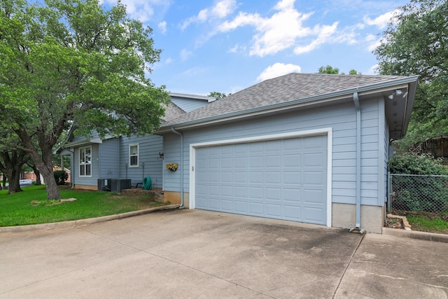 504 Hilltop Pl, Joshua, TX 76058 - view of front facade with concrete driveway, a shingled roof, a garage, and central AC unit