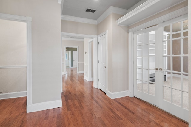 504 Hilltop Pl, Joshua, TX 76058 - hallway with ornamental molding, wood finished floors, baseboards, and french doors