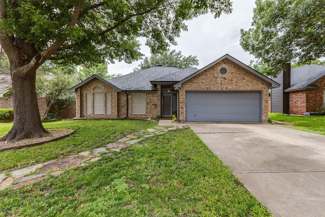 143 Westwood Dr, Rockwall, TX 75032 - single story home with a garage, concrete driveway, a front lawn, brick siding, and a shingled roof