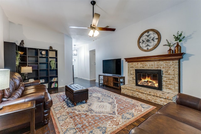 143 Westwood Dr, Rockwall, TX 75032 - living room featuring wood finished floors, ceiling fan, a brick fireplace, and baseboards