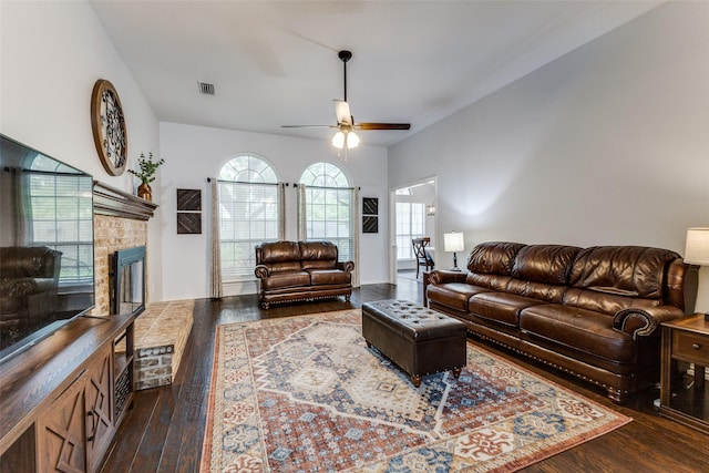 143 Westwood Dr, Rockwall, TX 75032 - living room with hardwood / wood-style floors, a ceiling fan, and a glass covered fireplace