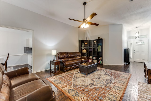 143 Westwood Dr, Rockwall, TX 75032 - living room with vaulted ceiling, a ceiling fan, wood finished floors, and baseboards