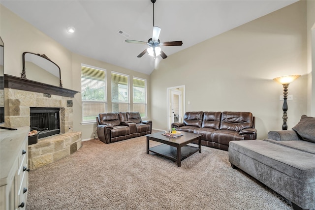 583 Louder Way, Fate, TX 75087 - carpeted living room with ceiling fan, lofted ceiling, a stone fireplace, and baseboards
