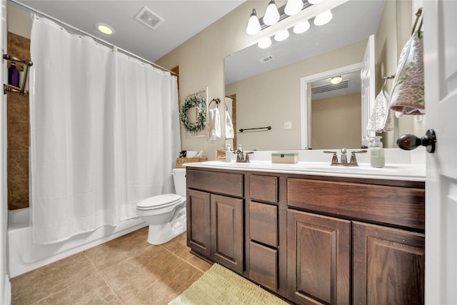 583 Louder Way, Fate, TX 75087 - bathroom featuring double vanity, toilet, shower / bath combo with shower curtain, and tile patterned flooring