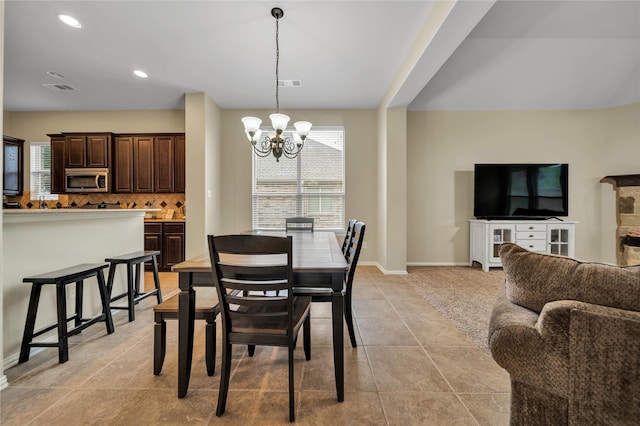 583 Louder Way, Fate, TX 75087 - dining space featuring a chandelier, light tile patterned floors, baseboards, and recessed lighting
