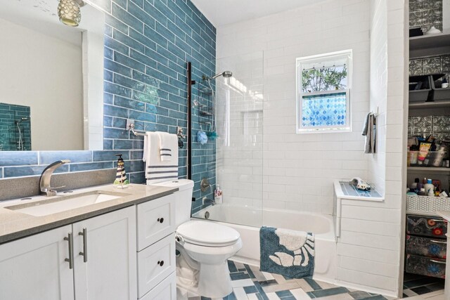 2704 Travis Ave, Fort Worth, TX 76110 - bathroom with vanity, toilet, and bathing tub / shower combination