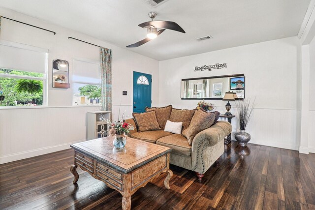 2704 Travis Ave, Fort Worth, TX 76110 - living area featuring hardwood / wood-style flooring, ceiling fan, and baseboards