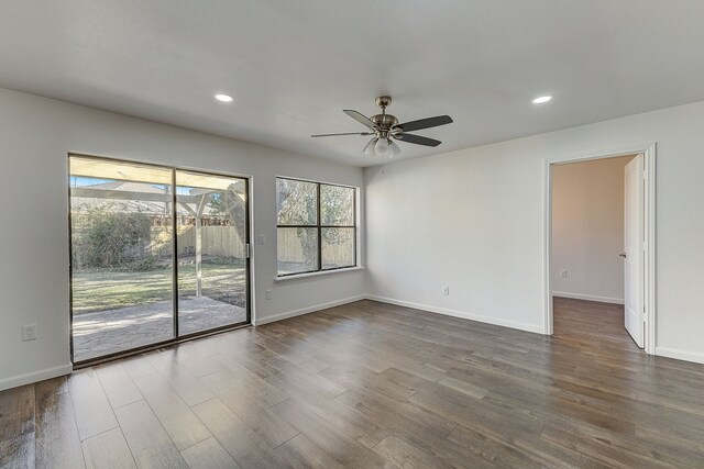 816 Northwood Rd, Fort Worth, TX 76107 - unfurnished room featuring dark wood-type flooring, a ceiling fan, recessed lighting, and baseboards