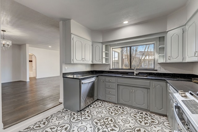 816 Northwood Rd, Fort Worth, TX 76107 - kitchen featuring open shelves, a sink, arched walkways, dishwasher, and gray cabinets