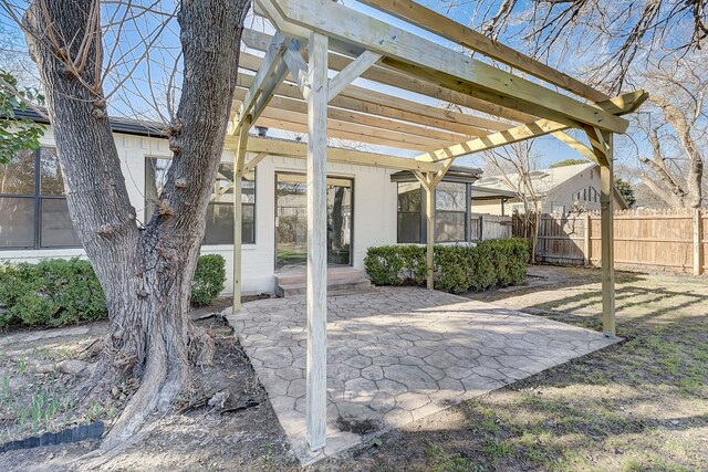 816 Northwood Rd, Fort Worth, TX 76107 - view of patio featuring a pergola and a sunroom