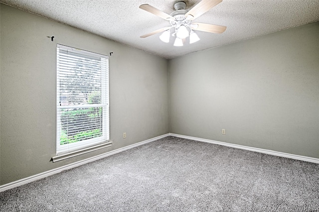 614 Brookfield Dr, Garland, TX 75040 - spare room with carpet, a ceiling fan, baseboards, and a textured ceiling