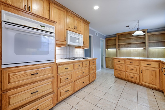 614 Brookfield Dr, Garland, TX 75040 - kitchen featuring white appliances, open shelves, crown molding, tile counters, and backsplash