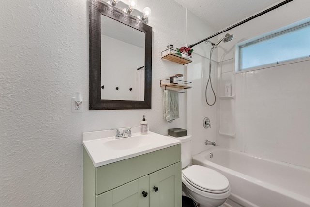 3008 Albany Dr, Mesquite, TX 75150 - bathroom featuring a textured wall, toilet, vanity, and tub / shower combination
