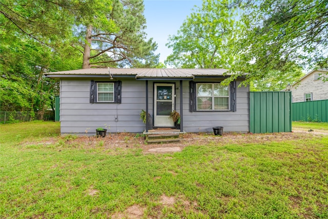 5990 Lamar Rd, Reno, TX 75462 - view of front of property with a metal roof