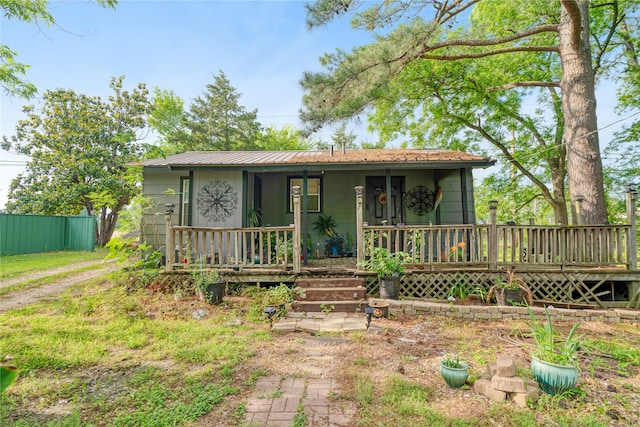 5990 Lamar Rd, Reno, TX 75462 - single story home featuring a metal roof