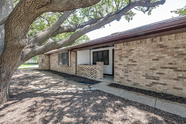 101 Circleview Dr S, Hurst, TX 76054 - view of side of home with brick siding