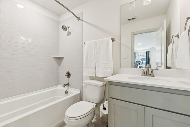 984 Mikaela Dr, Allen, TX 75013 - bathroom featuring washtub / shower combination, toilet, and vanity