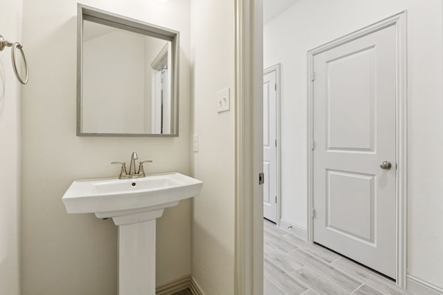 984 Mikaela Dr, Allen, TX 75013 - bathroom featuring wood finished floors and baseboards