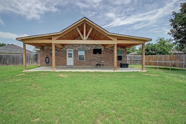 1103 Lynnwood Ct, Cleburne, TX 76033 - back of property with a patio and brick siding