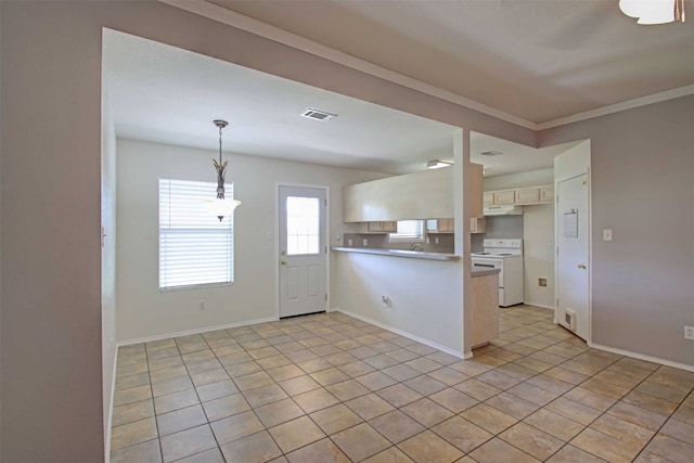 1103 Lynnwood Ct, Cleburne, TX 76033 - kitchen featuring white range with electric stovetop, a peninsula, pendant lighting, light tile patterned floors, and baseboards
