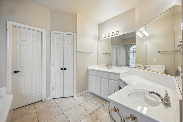 315 Hudson Falls Dr, Arlington, TX 76002 - full bathroom featuring vanity, tile patterned floors, and a closet