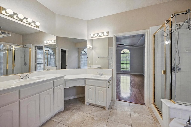315 Hudson Falls Dr, Arlington, TX 76002 - full bathroom with a stall shower, double vanity, and tile patterned flooring