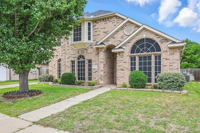 315 Hudson Falls Dr, Arlington, TX 76002 - view of front of property with brick siding and cooling unit