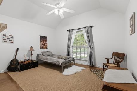 240 Lakeside Oaks Cir, Lakeside, TX 76135 - bedroom featuring lofted ceiling, access to outside, and a ceiling fan