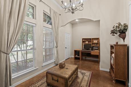 240 Lakeside Oaks Cir, Lakeside, TX 76135 - entrance foyer featuring arched walkways, a towering ceiling, a chandelier, and baseboards