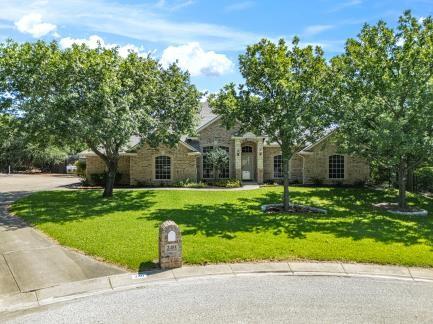 240 Lakeside Oaks Cir, Lakeside, TX 76135 - obstructed view of property with a front yard
