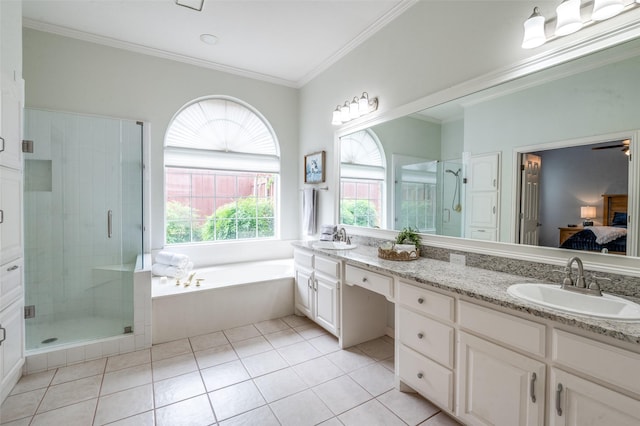 5909 La Cumbre Dr, Mckinney, TX 75072 - full bathroom with double vanity, a stall shower, a garden tub, connected bathroom, and ornamental molding