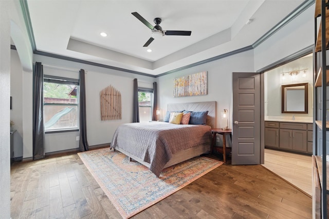 537 Sheer Bliss Ln, Fort Worth, TX 76114 - bedroom featuring multiple windows, wood finished floors, a raised ceiling, connected bathroom, and recessed lighting