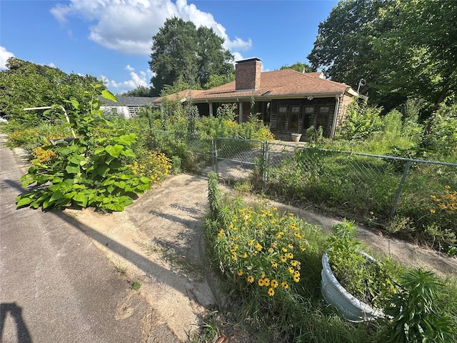 609 Hickory, Hughes Springs, TX 75656 - view of yard featuring a gate