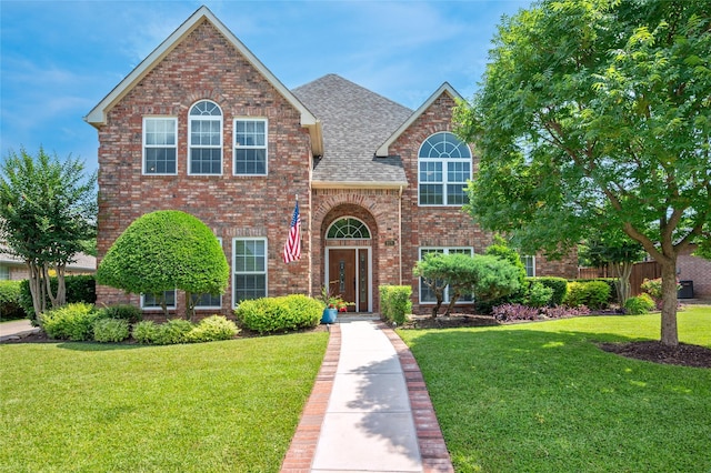 928 Rush Creek Rd, Keller, TX 76248 - traditional-style home featuring a front yard, a shingled roof, and brick siding