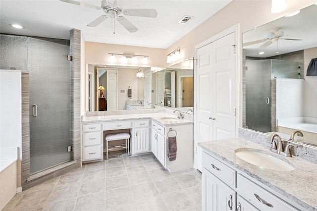 928 Rush Creek Rd, Keller, TX 76248 - full bath featuring ceiling fan, vanity, a stall shower, a garden tub, and tile patterned floors