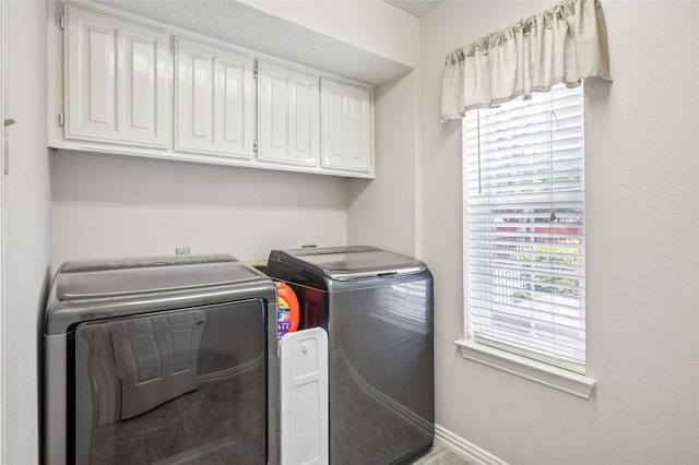928 Rush Creek Rd, Keller, TX 76248 - laundry room featuring separate washer and dryer, cabinet space, baseboards, and tile patterned flooring