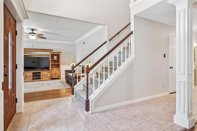 928 Rush Creek Rd, Keller, TX 76248 - stairs with ornate columns, a ceiling fan, tile patterned flooring, a textured ceiling, and crown molding