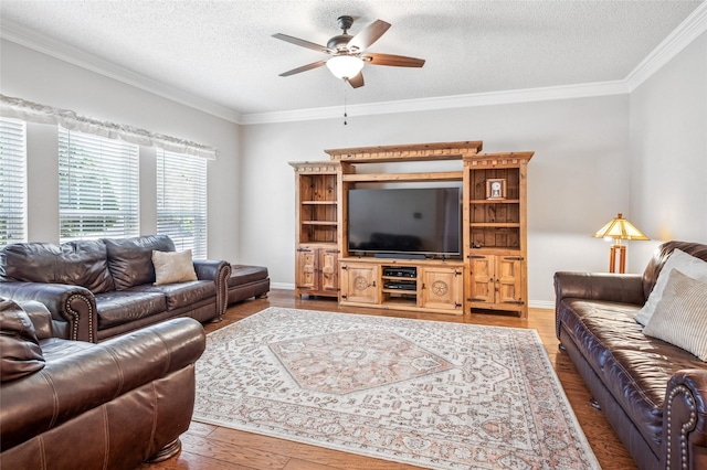 928 Rush Creek Rd, Keller, TX 76248 - living area with ceiling fan, a textured ceiling, ornamental molding, wood finished floors, and baseboards