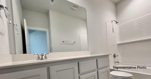 2006 Iris, Melissa, TX 75454 - bathroom featuring toilet, vanity, and tub / shower combination