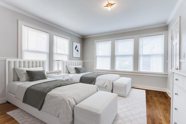 3913 Modlin Ave, Fort Worth, TX 76107 - bedroom with multiple windows, ornamental molding, dark wood-style floors, and baseboards
