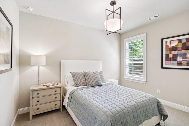 8229 Halifax, The Colony, TX 75056 - bedroom featuring carpet floors and baseboards