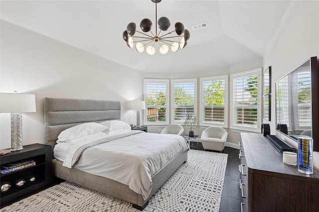 8229 Halifax, The Colony, TX 75056 - bedroom featuring wood finished floors, a chandelier, lofted ceiling, and baseboards